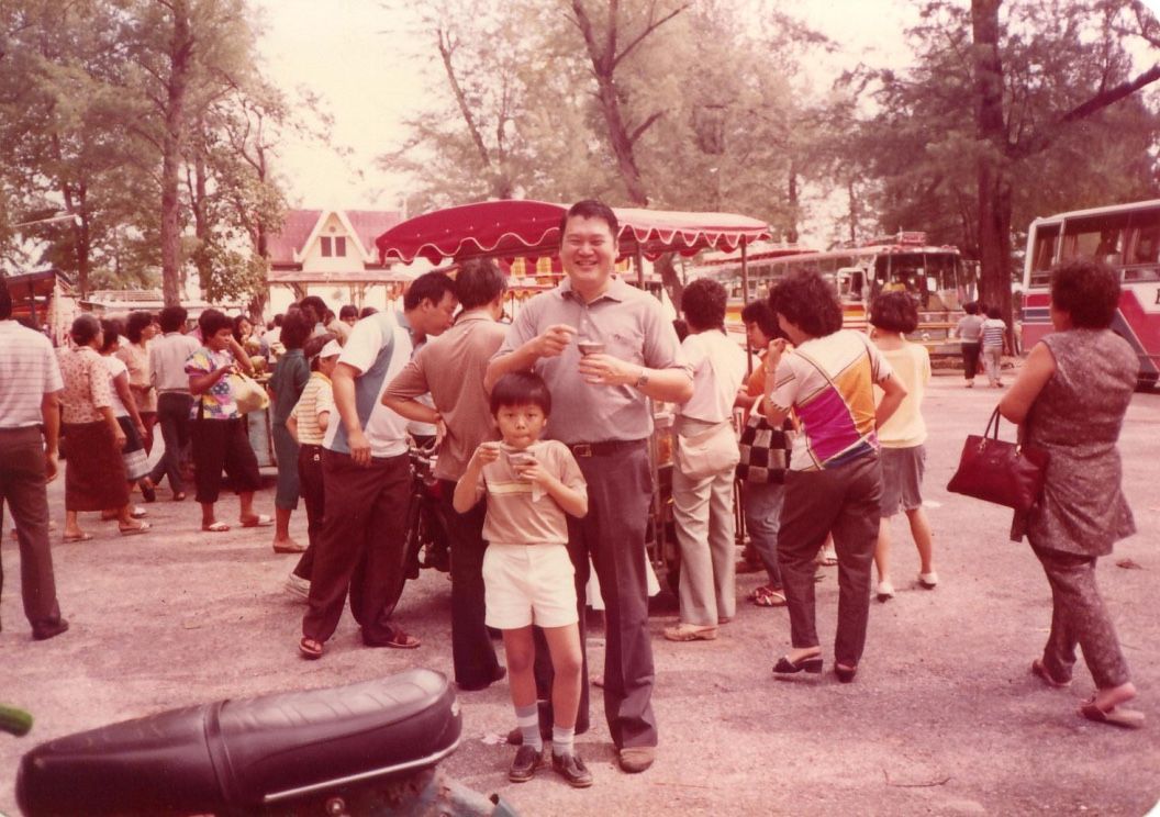 Dr Lincoln Tan as a child with his dad, Dr Robert Tan