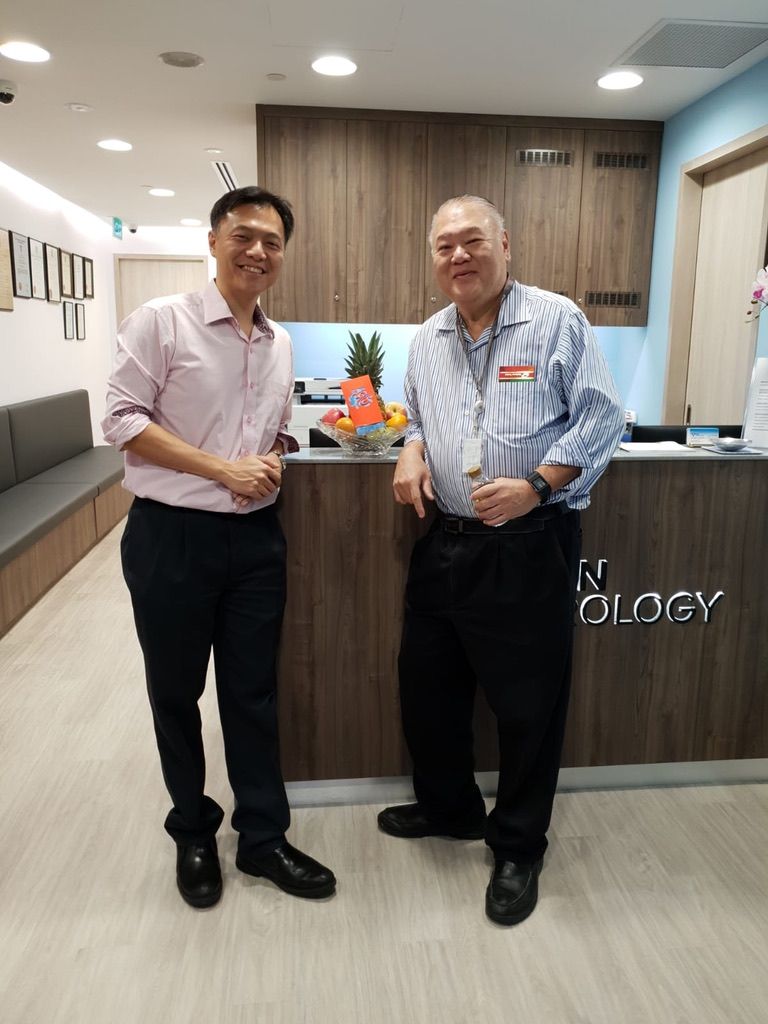 Dr Lincoln Tan (left) with Dr Robert Tan at the clinic